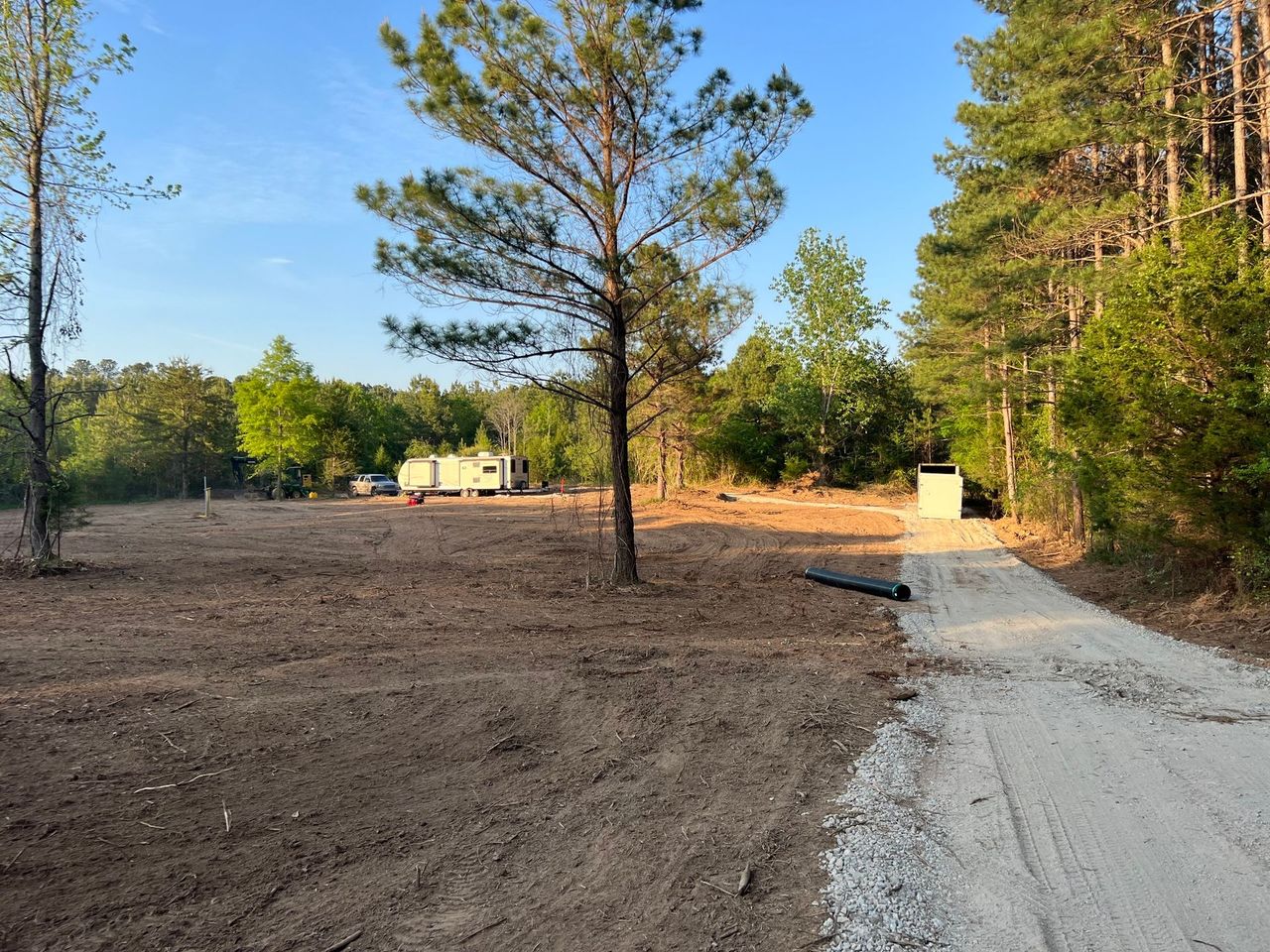 Excavator working on land clearing project in Simpsonville SC